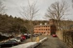 The New Frontiers Functional Medicine & Nutrition Clinic is housed on the fourth floor of a rehabilitated old brick mill building, overlooking the Pootatuck River.