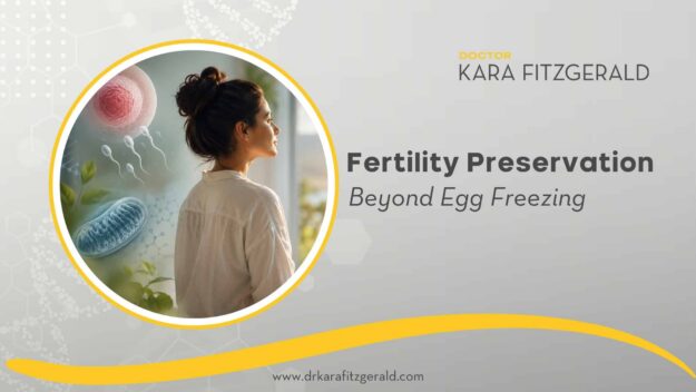 A woman looking out a sunlit window surrounded by imagery representing fertility, mitochondria, and reproductive health, illustrating a holistic approach to fertility preservation beyond egg freezing.